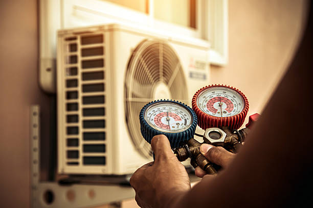 Professional Heat Pump Repair technician working in North Billerica, MA